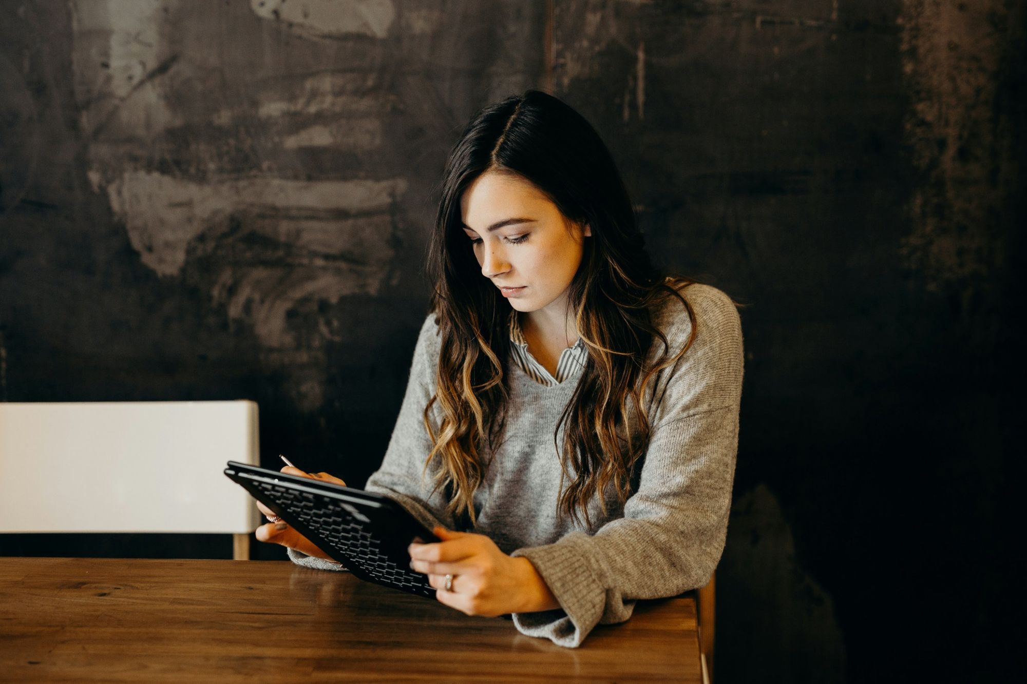 A person focused on work at a desk